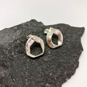 Flow hoop silver stud earrings