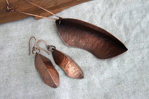 Kiss copper fold formed necklace