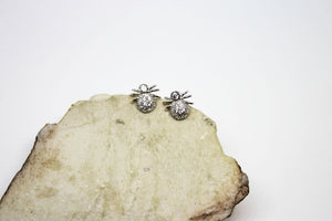 Tick ​​silver earrings with zirconia